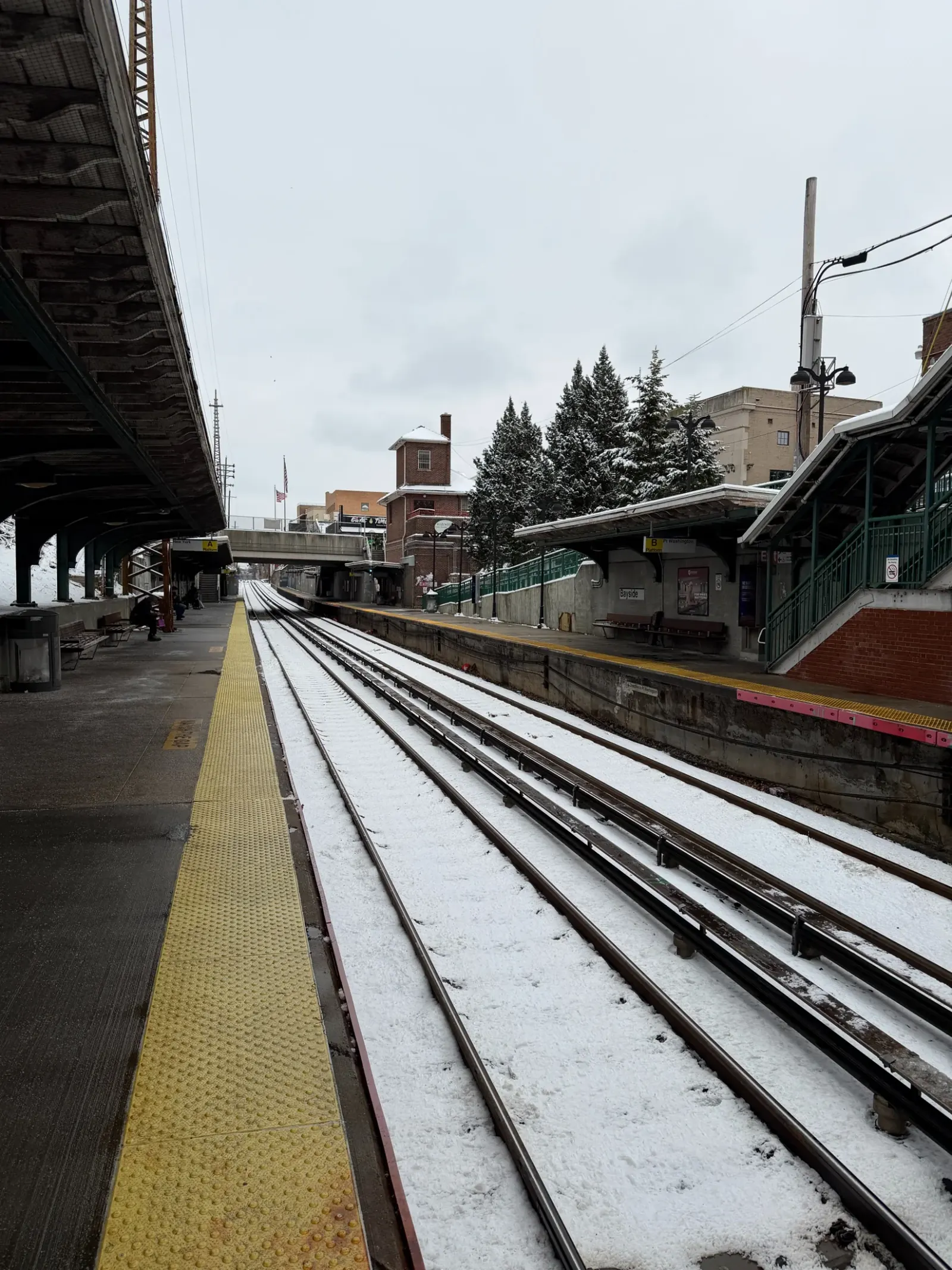 Snow-covered tracks at Bayside station.